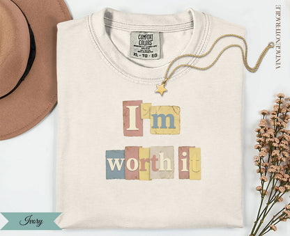 Ivory t-shirt with "I'm worth it" in colorful block letters.