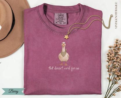 Berry t-shirt with goose graphic and "that doesn't work for me" text.