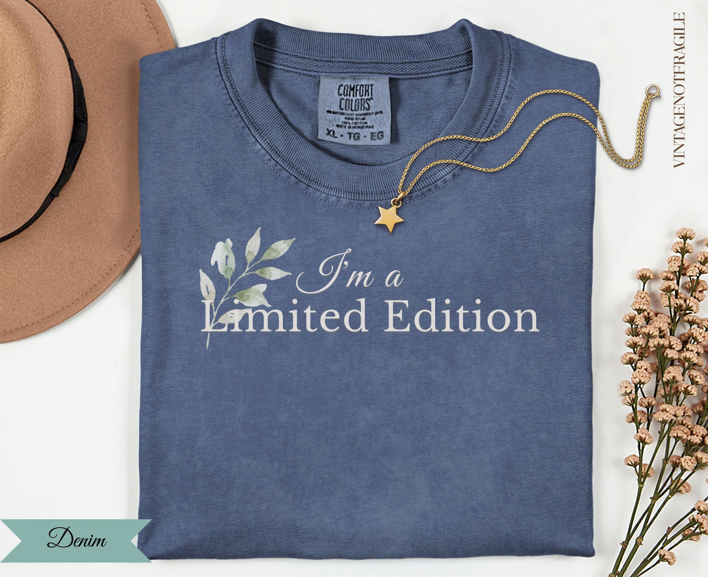 Denim t-shirt with "I'm a Limited Edition" text and floral graphic.