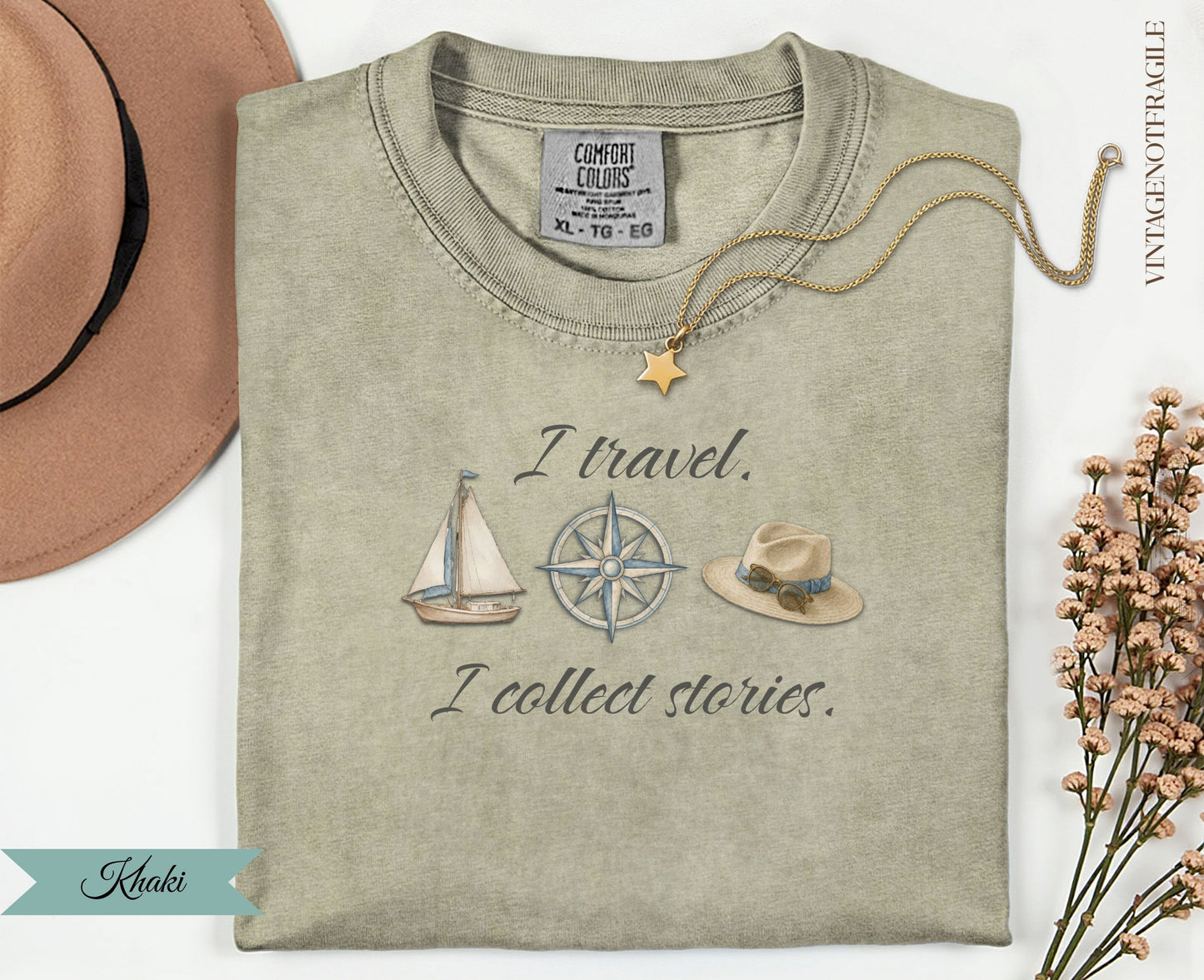 Khaki t-shirt with nautical and travel graphics and text.