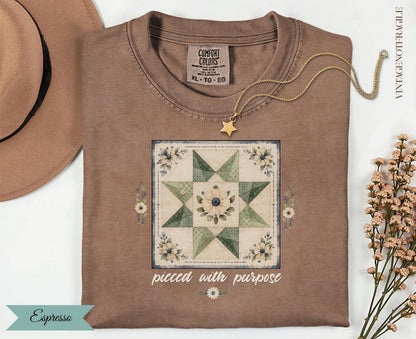 Brown Comfort Colors t-shirt with quilt design and "pieced with purpose" text.