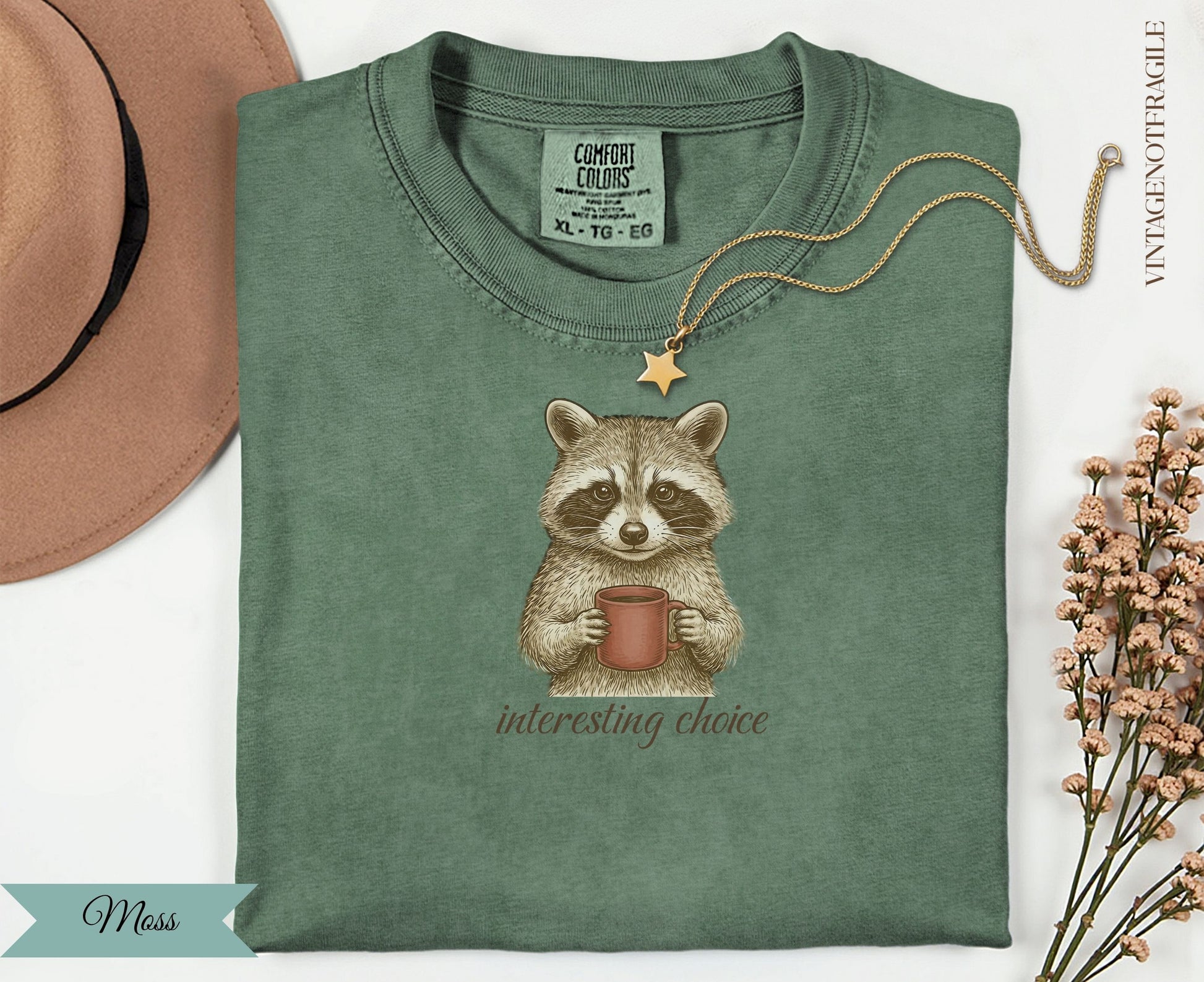 Raccoon wearing a tag, holding a mug with "interesting choice" text.