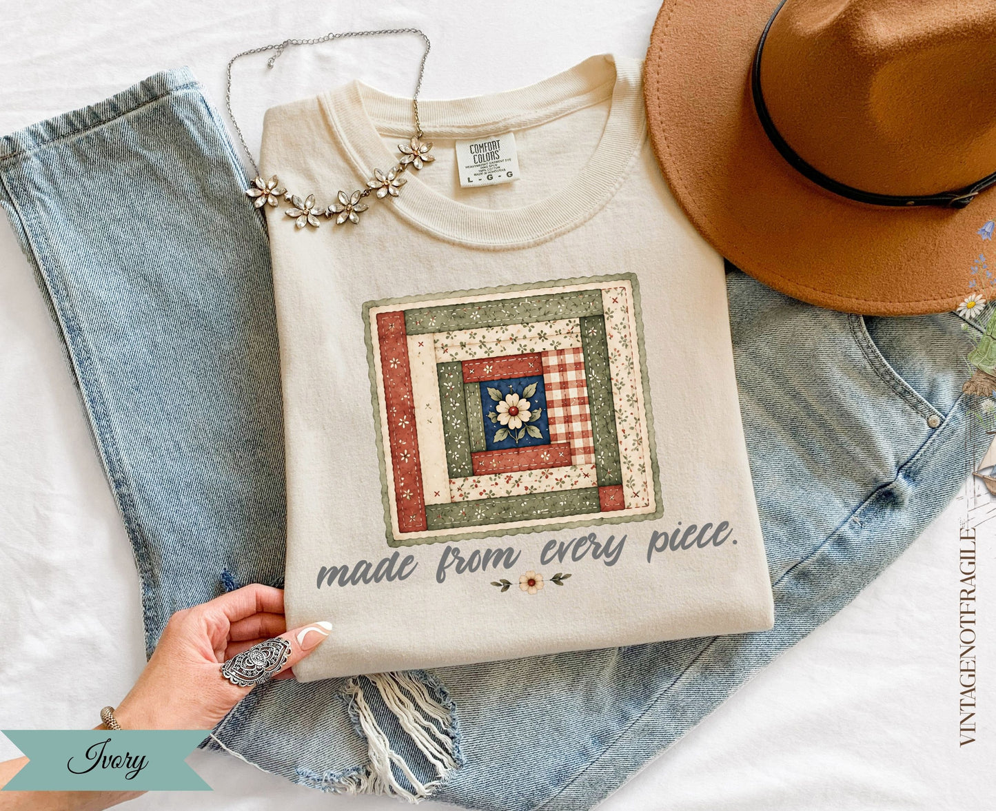 Cream sweatshirt with patchwork quilt design and text "made from every piece."