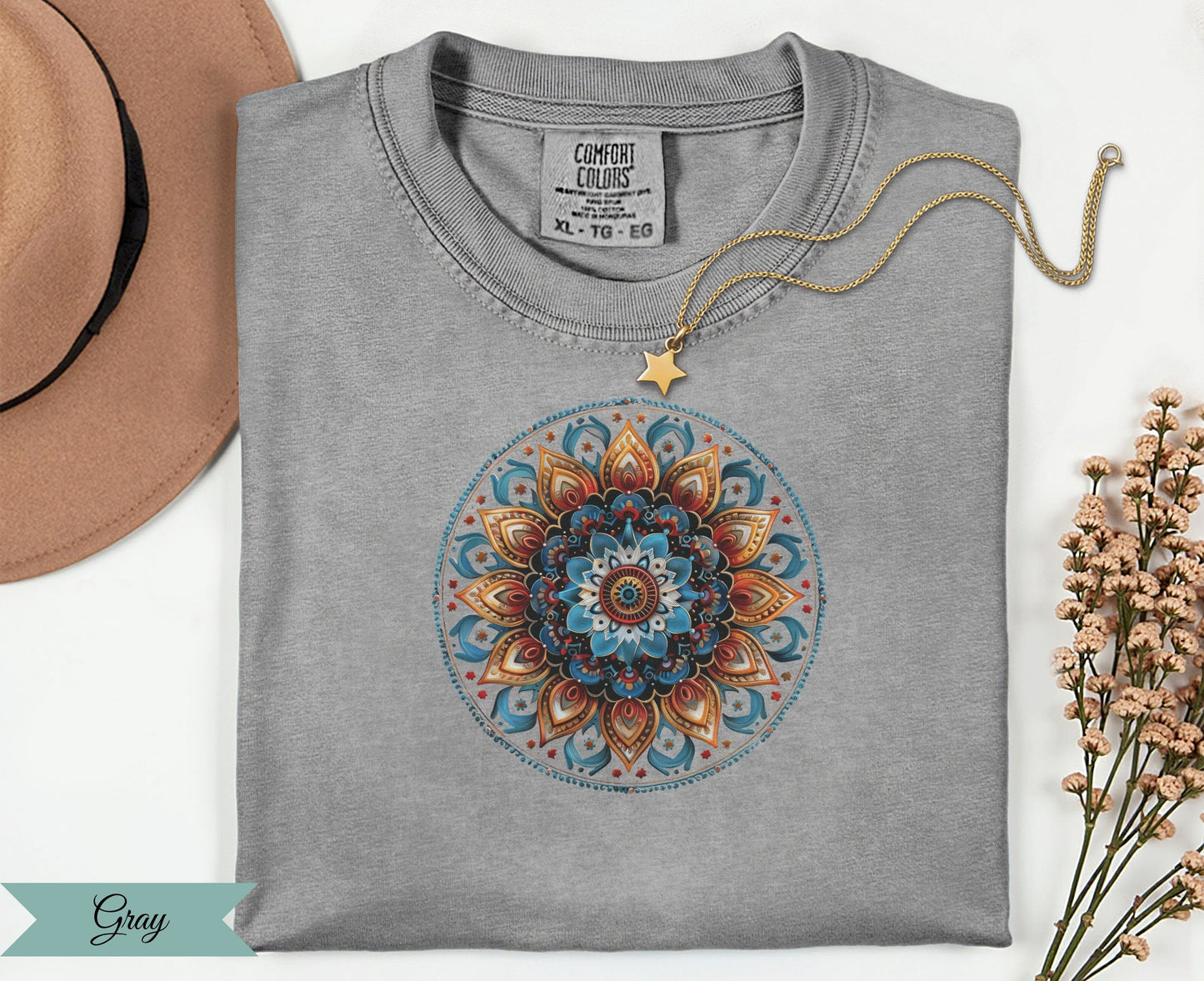 Gray comfort colors t-shirt with mandala design and gold star necklace.