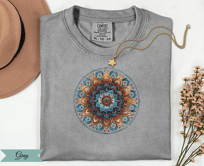 Gray comfort colors t-shirt with mandala design and gold star necklace.